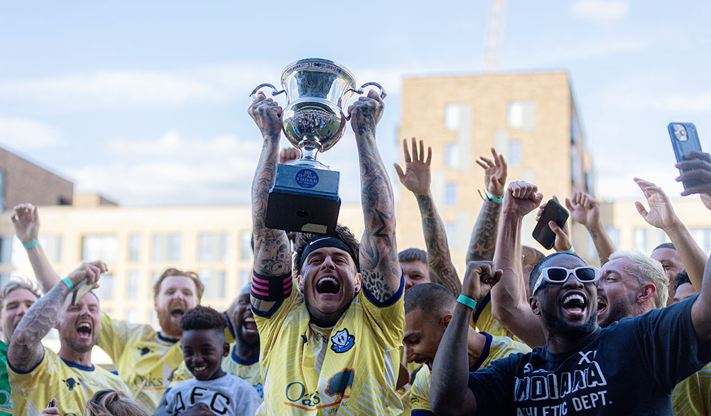 Goals 4 Gosh Winners Celebrate their shoot out victory.